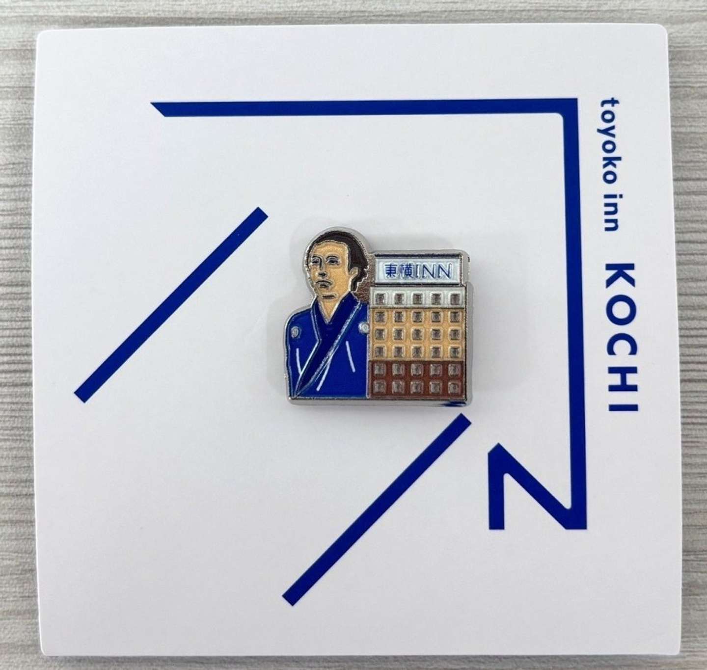 26年2月に出店する高知の東横INNの「ご当地GENKIバッジ」（画像提供：東横INN）